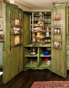 Pantry cabinet revolving shelves
