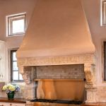 Stove hood with antique corbels