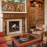 Fireplace mantel with surround and media cabinet