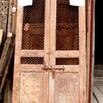 antique doors used to make linen cabinet