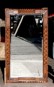 carved mirror with L-strapping
