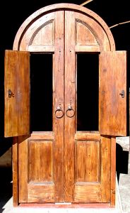 detail of arched door with shutters