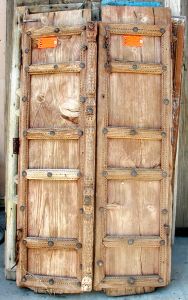 Antique doors with carved astragal