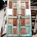 Antique cabinet doors used to make gate