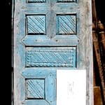 antique door used to make door with carved panels