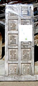 antique carved panels used to make carved cabinet