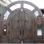 Arched double door in surround