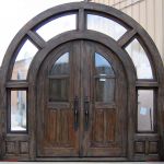 Custom front entry in arched surround