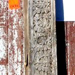 Carved antique panel used to make fireplace mantel