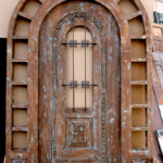 Arched door with transom before glass
