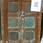 Antique cabinet doors with carved panels