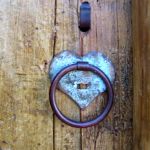 Pull ring with copper heart escutcheon