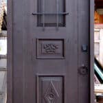 Door with carved panels front