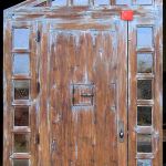 Custom door with triangular transom