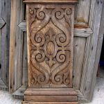 Antique column base with design used for hand carved buffet cabinet