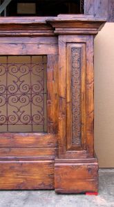 Inset carving detail of custom living room dividers