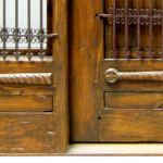door with sidelights carving detail