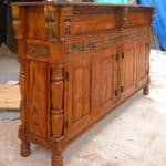 Angle shot of carved cabinet