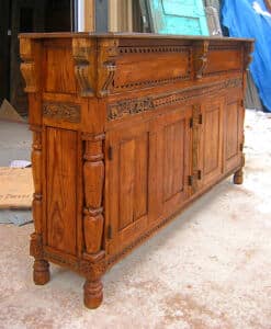 Angle shot of carved cabinet