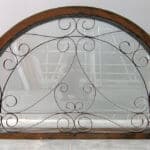 transom for front entry with cross shaped peep