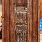Front door with carved panels
