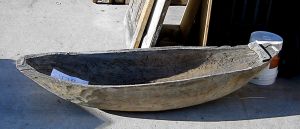 Antique canoe used to make copper-lined sink
