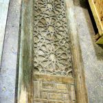 Antique door used to make front entry with sidelights