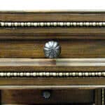 Drawer and beading detail on vanity cabinet