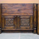 Custom rustic kitchen cabinet with carved panels