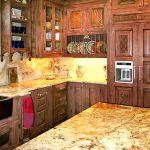 Carved wood refrigerator panels and cabinets