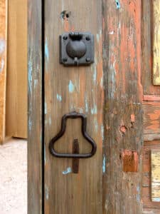 hardware detail on front of four panel door