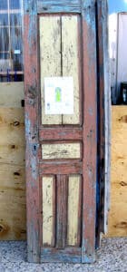 front of antique Mexican four panel door