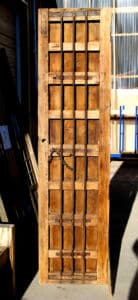 Antique door used to make Door with Carved Panels