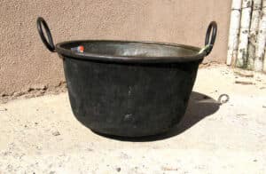 Antique copper cauldron for custom bathroom vanity