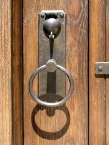 door with iron strapping hardware detail front