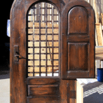 arched door with shutter