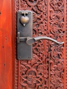 hardware detail on pintle hinged door