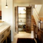 Custom bar pantry doors made with antique Mexican doors