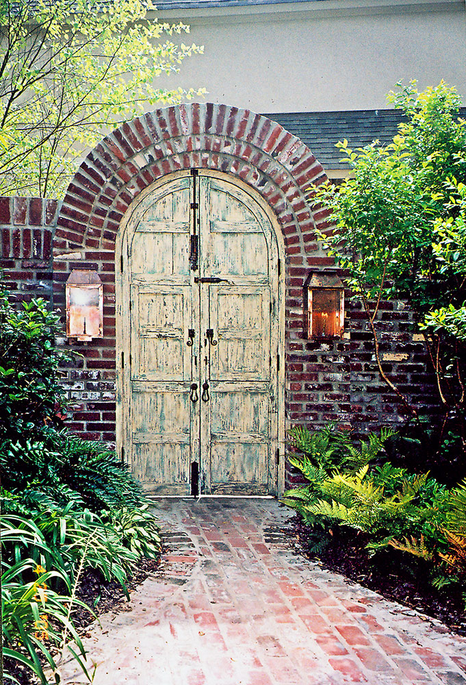 Arched double gates with shutters