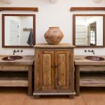 Pair of rustic vanities and linen cabinet