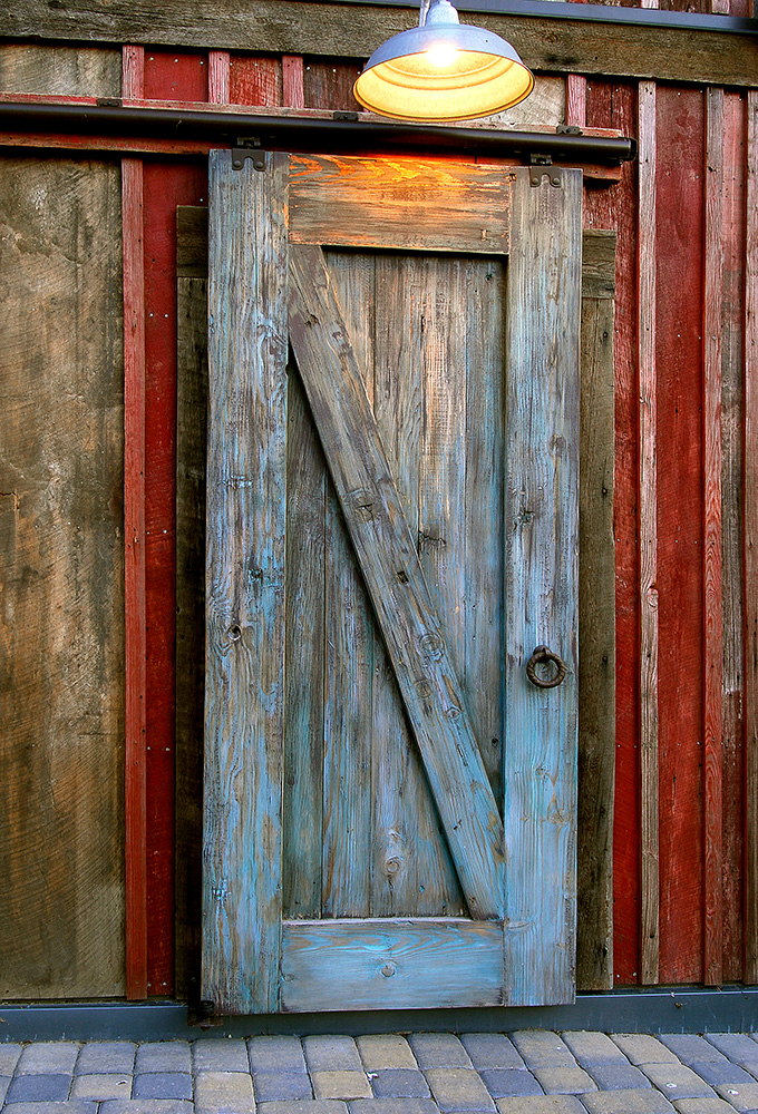 Custom barn sliding door made with salvaged lumber