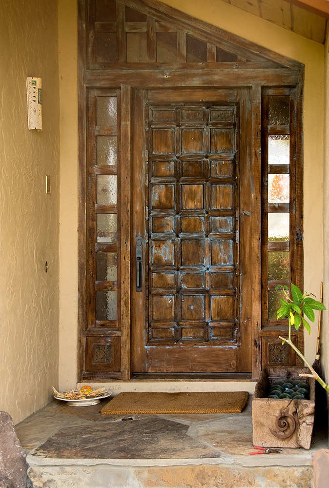 Door with angled transom