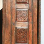 door with carved panels