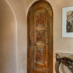 Door with carved panels