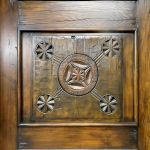 Antique carved panel with closed peep window