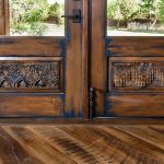 Antique carved panel detail on French doors