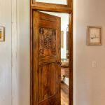 powder room door with transom