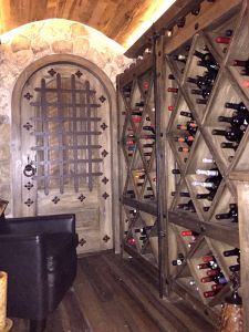 installed arched wine cellar door