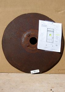Antique plow disk used in custom door