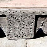 antique corbel used to make fireplace mantel